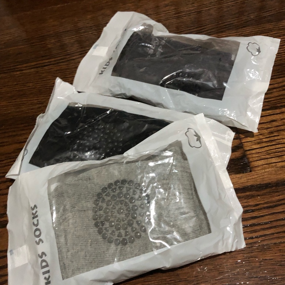 3 packs of baby kneepads in black and gray - Brand new in packages